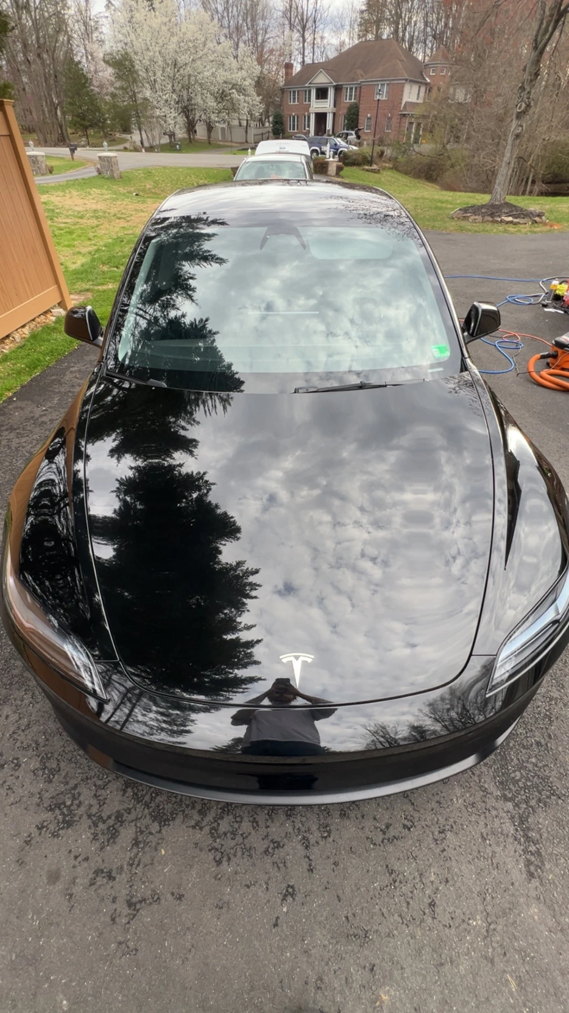 Black Tesla with a glossy refined finish after Detail VA service